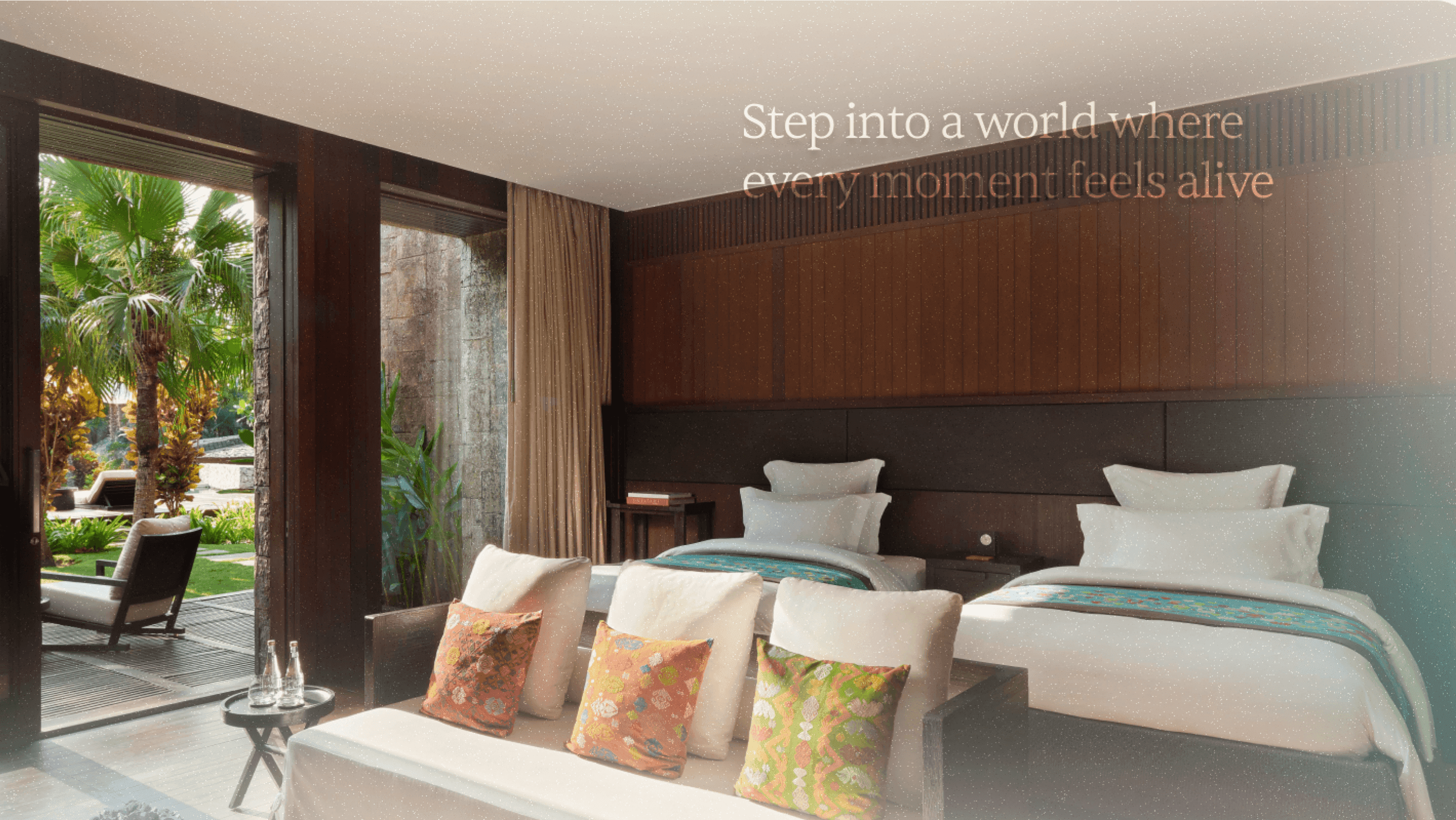 Wellim hotel room opening onto a tropical garden
